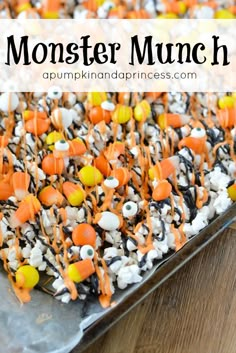 a tray filled with halloween candy and candies