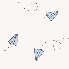 several paper airplanes are flying in the sky