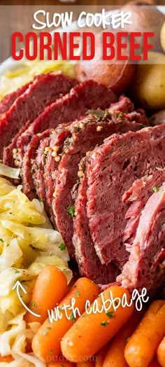 slow cooker corned beef with cabbage and carrots on a white platter