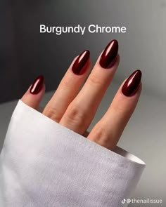 When it comes to burgundy chrome nails, there are so many design possibilities to choose from. Whether you prefer simple, elegant nails or something more detailed and artistic, the options are endless. Burgundy chrome gives off a high-shine, almost mirror-like effect that’s perfect for showcasing your nail art.  Some popular designs include adding intricate details like metallic stripes, tiny rhinestones, or subtle glitter accents. You can also try geometric patterns or mix in other colors like Holiday Classic Nails, Hailey Bieber Nails Burgundy, Fall Nail Inspo Burgundy, Red Chrome Nails With Rhinestones, Maroon Nails Gold Accent, Chrome November Nails, Wine Red With Chrome Nails, Red Wine Crome Nails, Acrylic Maroon Nails