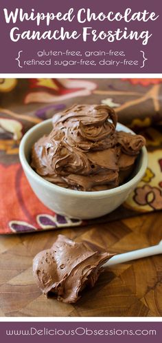 a bowl filled with chocolate ganache frosting on top of a table