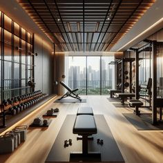 an empty gym with rows of exercise mats and benches in front of large windows overlooking the city