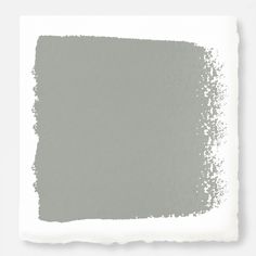 a gray paint swatch on a white background