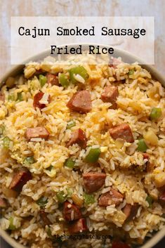 a close up of a bowl of food with rice and sausage on it, text reads cajun smoked sausage fried rice