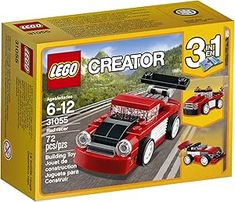 the box is full of legos and it has a red car with black hood