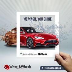 a hand holding up a card that says we wash, you shine national highway motor