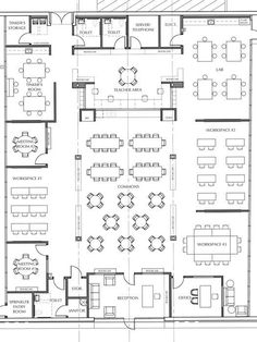 the floor plan for an office with tables and chairs, desks, and seating areas