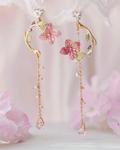 These earrings feature a design inspired by Chinese classical aesthetics, showcasing asymmetrical floral motifs that echo the grace of ancient beauty. Elevate your style with these distinctive dangle earrings, perfectly blending tradition with a contemporary flair for a truly enchanting look. **Product name** Chinese Classic Ancient Beauty Floral Style Asymmetry Drop Dangle Earrings **Size** Pink - Length: 8.9 cm; Width: 2.2 cm Green With Cat - (L) Length: 8.3 cm; Width: 1.3 cm; (R) Length: 5.9 cm; Width: 1.6 cm Green With Butterfly - (L) Length: 11.7 cm; Width: 1.8 cm; (R) Length: 10.5 cm; Width: 1.9 cm Red - (L) Length: 7.5 cm; Width: 2.0 cm; (R) Length: 5.7 cm; Width: 1.8 cm Blue - (L) Length: 7.8 cm; Width: 1.3 cm; (R) Length: 6.5 cm; Width: 1.3 cm **Packaging** - Each order is thought Hand Painted Earrings, Asymmetrical Earrings, Painted Earrings, Tassel Drop Earrings, Statement Drop Earrings, Long Dangle Earrings, Summer Earring, Floral Earrings, Bridesmaid Jewelry