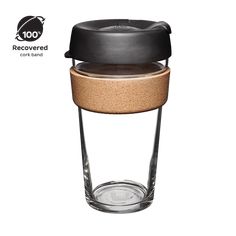 the glass cup has a cork lid and is black