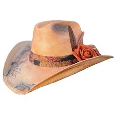 Take on the wild west in style with our Blessed Hand Painted Hat. Made from premium straw, this small-sized cowboy hat is a statement piece. Hand painted flowers and vintage details, accented with metal feathers, add a unique touch. Painted Hats, Vintage Details, The Wild West, Boho Aesthetic, Hand Painted Flowers, Painted Flowers, Little Birds, Cowboy Hat, Custom Hats