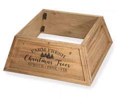 a wooden box with the words farm fresh christmas trees on it