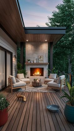 an outdoor living area with furniture and fire place