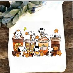 Cute Design ! Custom Made And Will Ship Within A Few Days! On Gildan Unisex Short Sleeve Sublimation Check Out My Page For More Designs Fall Snoopy Shirt, Snoopy Fall Autumn, Fall Snoopy, Snoopy Cute, Snoopy Fall, Fall Tee Shirts, Snoopy Shirt, Nurse Shirts, Browns Fans