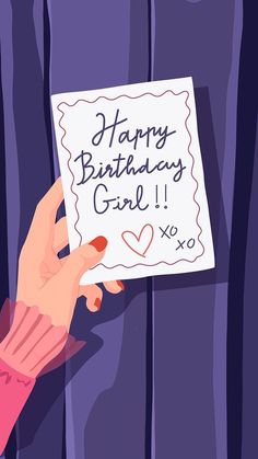 a person holding a birthday card with the words happy birthday girl written on it in front of them