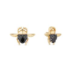 A gripping choice from the Enchanted Disney Fine jewelry Villains Collection inspired by Jafar, these pear-shaped black onyx and black diamond scarab beetle stud earrings are anything but ordinary. Fashioned in warm 10K gold Each flying scarab beetle glistens with a 6.0 x 4.0mm pear-shaped rich black onyx and alluring black diamonds along the body. Polished yellow gold wings, legs and head add eye-catching shine. These 1/8 ct. t.w. diamond post earrings secure comfortably with friction backs. ©D Enchanted Disney, Enchanted Disney Fine Jewelry, Disney Fine Jewelry, Scarab Beetle, Black Diamonds, Disney Villains, 10k Gold, Jewelry Ideas, Black Diamond