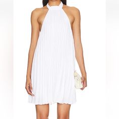 Alice +Olivia Aviana Halter Neck White Mini Dress Size Medium Brand New With Tags Mini Dress Sleeveless-Hem Shaped A-Line , Elegant Pleated Sleeveless Beach Dress, Elegant Pleated Sleeveless Dress For Beach, Chic White A-line Pleated Dress, White Pleated Summer Dress, Elegant Pleated Mini Dress For Day Out, Elegant White Pleated Dress For Summer, White Halter Mini Dress For Date Night, White Mini Length Halter Dress For Date Night, White Mini Halter Dress For Date Night