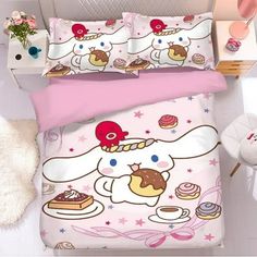 an image of a bed set with hello kitty and cupcakes