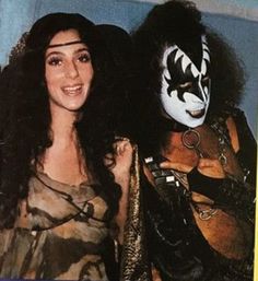 two people dressed up as kiss band members