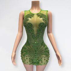 a mannequin wearing a green bodysuit with sequins