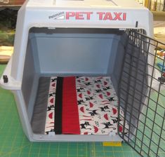 a small pet carrier that is sitting on a table