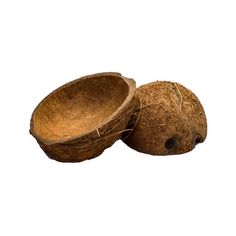 two whole coconuts sitting next to each other