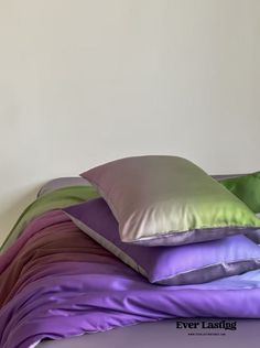 four pillows stacked on top of each other