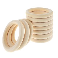 stack of wooden rings on white background