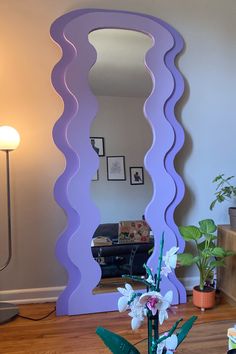 Wavy mirror in lavender. Spring home decor Curvy Mirrors, Groovy Mirror, Funky Apartment Decor, Chill Apartment Vibes, Warm Apartment Aesthetic, Room Decor Maximalist, Chill Apartment, Pastel Room Aesthetic, Funky Apartment