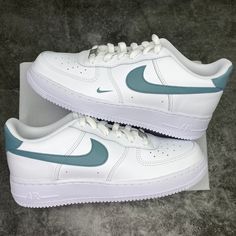 Custom sneakers hand painted authentic white Nike Air Force 1 Teal green grey swooshes and back of the sneakers small nike logo on the left sneaker All sneakers are made on order, please allow the indicated time for your item to be shipped. If you have any questions about the process time or do you need the sneakers quickly? Just send us a message!   * Be aware of your sneaker size, please in doubt go to the store first * Sneakers color may slightly vary due to photographic lighting and sources Nike Air Force 1 White With Gum Sole, Sneakers Nike Air Force, Rave Shoes, Custom Sneakers Nike, Sneakers Nike Air, Air Force Shoes, Painted Sneakers, Personalized Shoes, Cute Nike Shoes