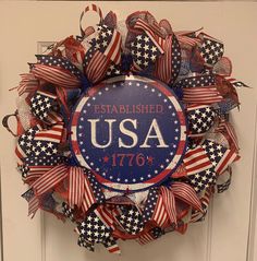 a patriotic wreath with the name usa written on it