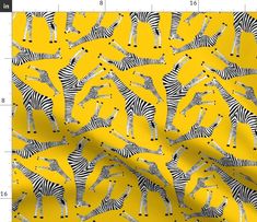 a yellow background with zebras and dots