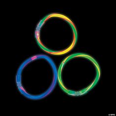 three glow bracelets on a black background