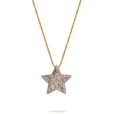 Shine bright with the Sparkly Baguette Diamonds Big Star Love Statement Necklace. This bold and glamorous necklace features a large star pendant encrusted with sparkling diamonds, with additional baguette diamonds enhancing its brilliance. The sleek gold steel chain perfectly complements the star, making it a standout piece for any fashion-forward wardrobe. Designed to keep the stars always with you, this stylish necklace is both a statement of elegance and a symbol of celestial beauty. Details 18K gold plated on Stainless Steel  Cz Diamonds  Necklace length 16" and 2'' extender Pendant height 0. 9'' Pendant width 0. 9'' Avoid contact with chemicals, makeup, parfume. Do not use dips or abrasive cleaners on necklace. To clean and brighten it up your necklace, wipe them gently with jewelry p Luxury Baguette Diamond Necklace For Party, Diamond Starburst Necklace With Diamond Accents, Diamond Starburst Necklace With Accents, Starburst Diamond Necklace With Accents, Luxury White Gold Star-shaped Diamond Necklace, Luxury Star-shaped White Gold Diamond Necklace, Luxury Star-shaped Diamond Necklace, Star-shaped Diamond Necklace With Single Cut Diamonds, Elegant Star Diamond Necklace With Diamond Accents