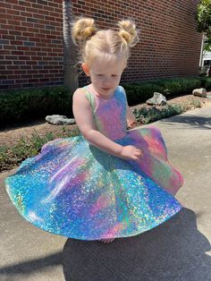 Very Twirly and Sparkly Girls Dress! Full circle skirt makes this dress perfect for little girls who love to twirl! Made from a breathable and soft 'quick dry' fabric- (like a bathing suit). Great for summer time fun and comfy all year round.  We hand make these dresses in small batches from our studio in Los Angeles. We hand pick all of our fabric to make sure it has the best color and feel.  See all of our awesome dresses by visiting our Etsy homepage: etsy.com/shop/fiandme This rainbow print Rainbow Sparkle, Shimmery Dress, Twirly Dress, Princess Dress Up, Shimmer Dress, Full Circle Skirt, Rainbow Dress, Dress Handmade, Popular Dresses