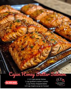 salmon fillets on a baking sheet ready to be cooked in the oven for dinner