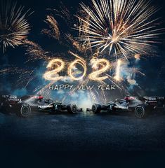 the new year is coming and fireworks are lit up in the sky above race cars