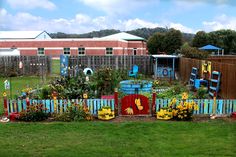 a colorful garden with lots of flowers in it