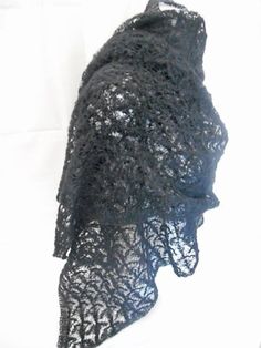 Handmade shawl knit lace, one model, 66 x 170 cm. Hand-wash only in cold water, reshape and lay flat to dry.                                                                                                                                                                                                                             (Châle en dentelle de tricot, modèle unique, 66 x 170 cm. Lavage main à l'eau froide, faire sécher à plat bien étalé, reconstituer le rectangle au cours du séchage).