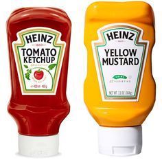 two ketchup bottles are shown side by side, one yellow and the other red