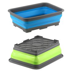 two plastic trays sitting on top of each other, one blue and the other green