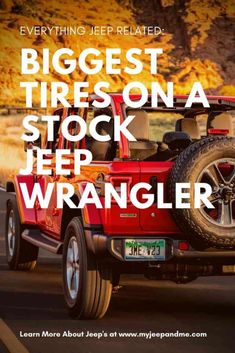 a red jeep driving down a road with the words biggest tires on a stock jeep wrangler