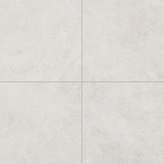 a white tile floor with four squares in the middle