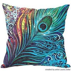 a colorful pillow with a peacock feather on it