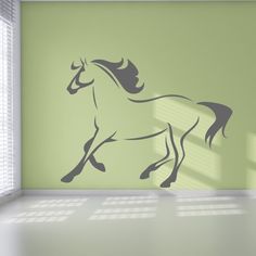 a horse is running in the room with green walls and white flooring, as well as an open window