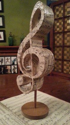 a sculpture made out of sheet music notes