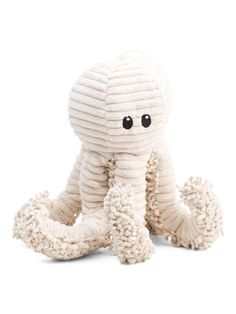 an octopus stuffed animal sitting on the ground