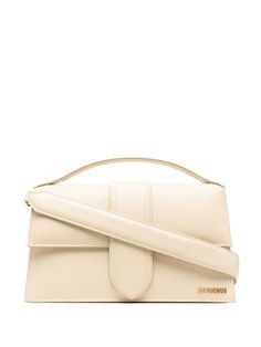 ivory white calf leather gold-tone logo lettering foldover top with magnetic fastening single top handle adjustable detachable shoulder strap Jacquemus Bag, White Purses, Leather Handbags Women, Woman Bags Handbags, Tote Bag Leather, Metallic Logo, Ivory White, White Bag, Leather Tote Bag