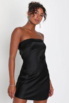 Get ready to arrive on the scene and cause a commotion in the Lulus Exquisite Approach Black Satin Strapless Cowl Back Mini Dress! Sleek satin shapes this flirty dress that features a straight, foldover neckline (with hidden no-slip strips) and a strapless, darted bodice. The flattering slip-style silhouette falls to a sexy mini hem, while an elasticized strap sits above a trendy cowl back. Hidden zipper/clasp at side. Fit: This garment fits true to size. Length: Mid-thigh. Size medium measures Silk Homecoming Dress, Black Hoco Dresses, Satin Hoco Dress, Cowl Back Dress, Black Satin Mini Dress, Strapless Dresses Short, Hoco Dresses Short, Black Silk Dress