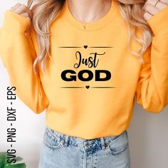 a woman wearing a yellow sweatshirt that says just god