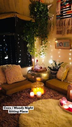 a living room filled with lots of furniture and candles